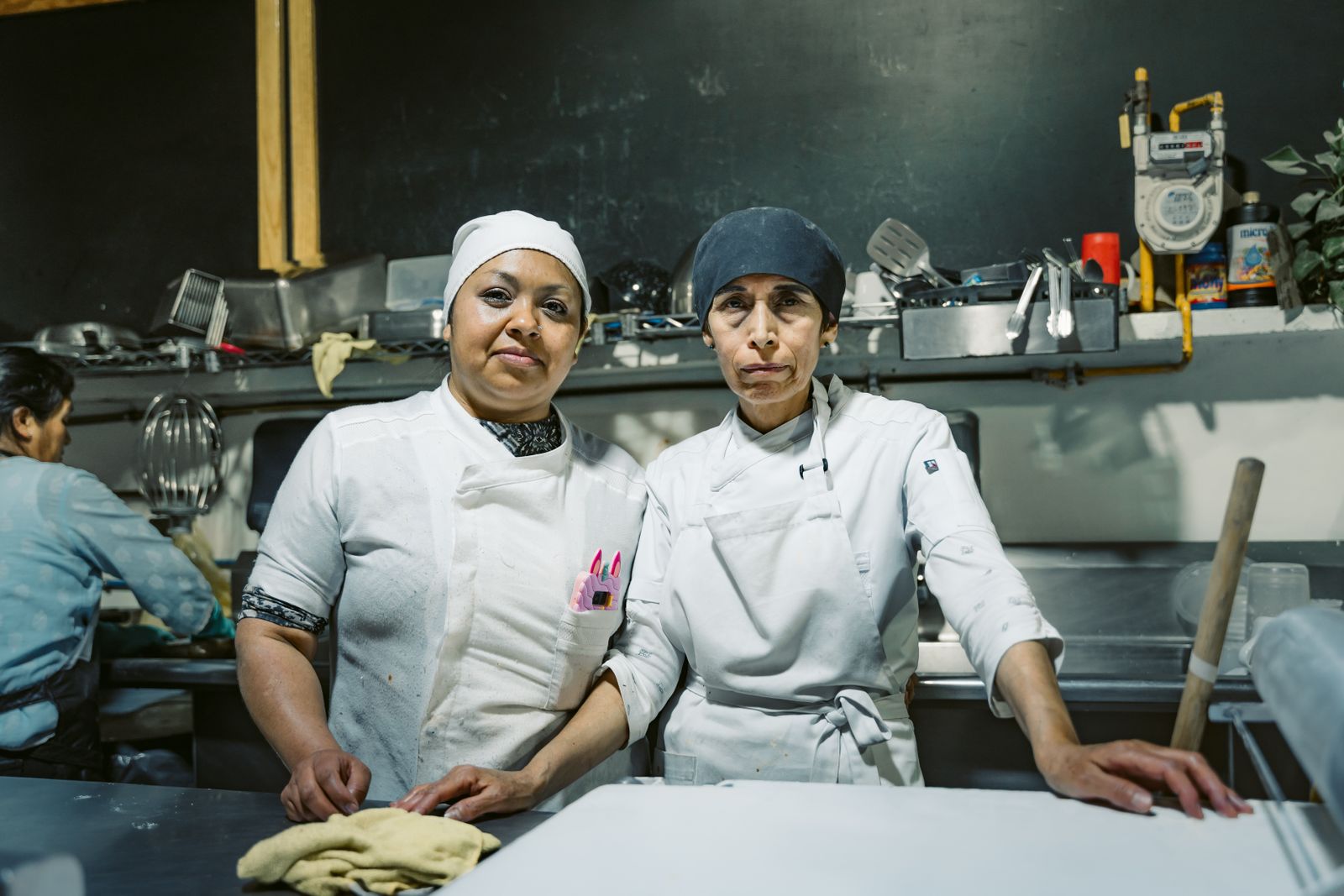 Kitchen team plating food